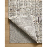 Featuring Jeremiah Brent x Loloi Bleecker Sage / Granite Rug by Loloi at Amethyst Home. The Bleecker Collection by Jeremiah Brent x Loloi is a soft, power-loomed rug in warm colorways that change in different lighting. With high-contrast linear patterns and careful distressing, Bleecker represents Jeremiah love of modern design. This collection is made of poly. Amethyst Home provides interior design, new home construction design consulting, vintage area rugs, and lighting in the Austin metro area.