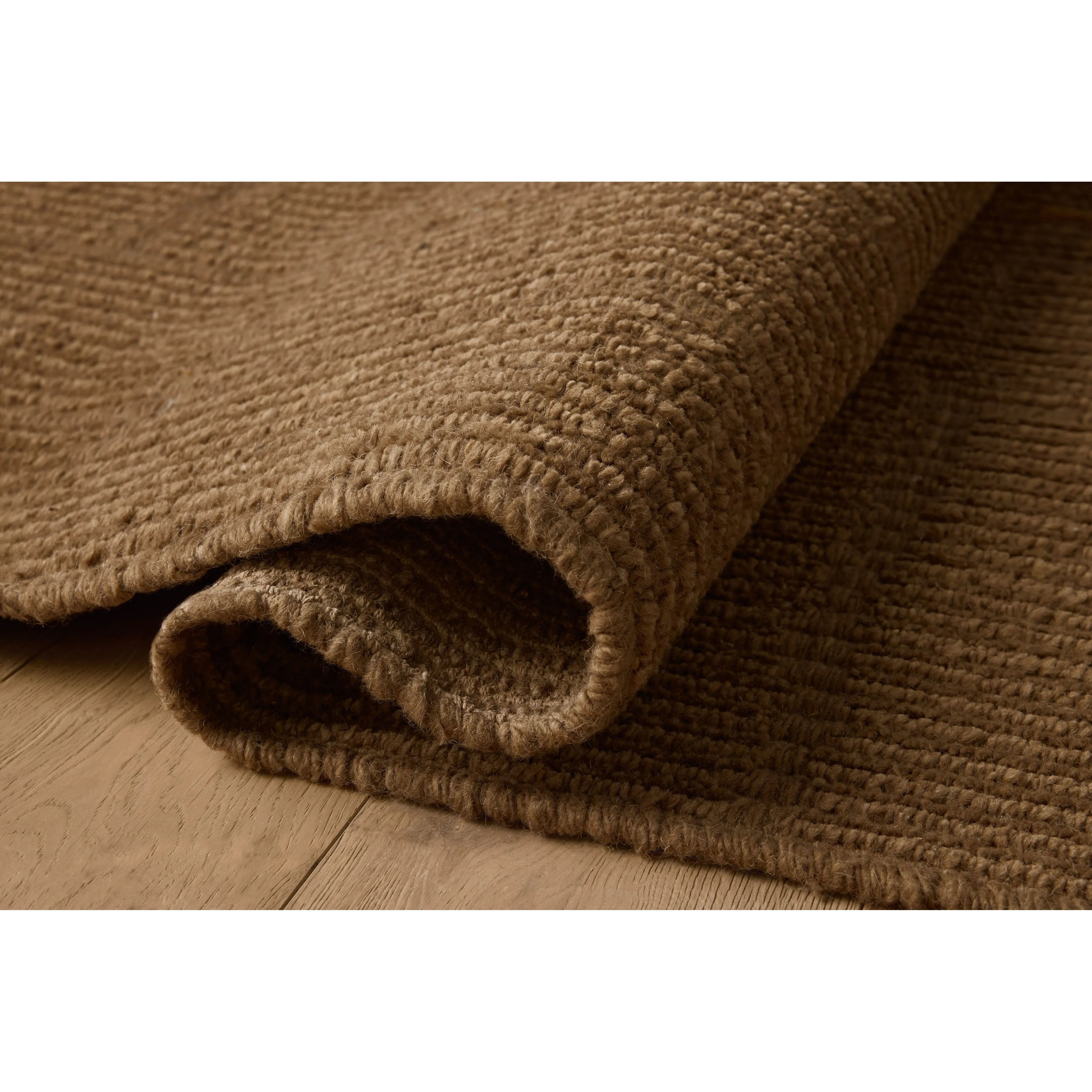 The Greenwich Collection by Jeremiah Brent x Loloi is a beautifully textured solid-toned area rug with subtle pile variation. Jeremiah loves this collection for its rich colors rooted in nature and a blended wool-and-cotton pile that’s softer and more malleable than typical wool. Amethyst Home provides interior design, new home construction design consulting, vintage area rugs, and lighting in the Park City metro area.