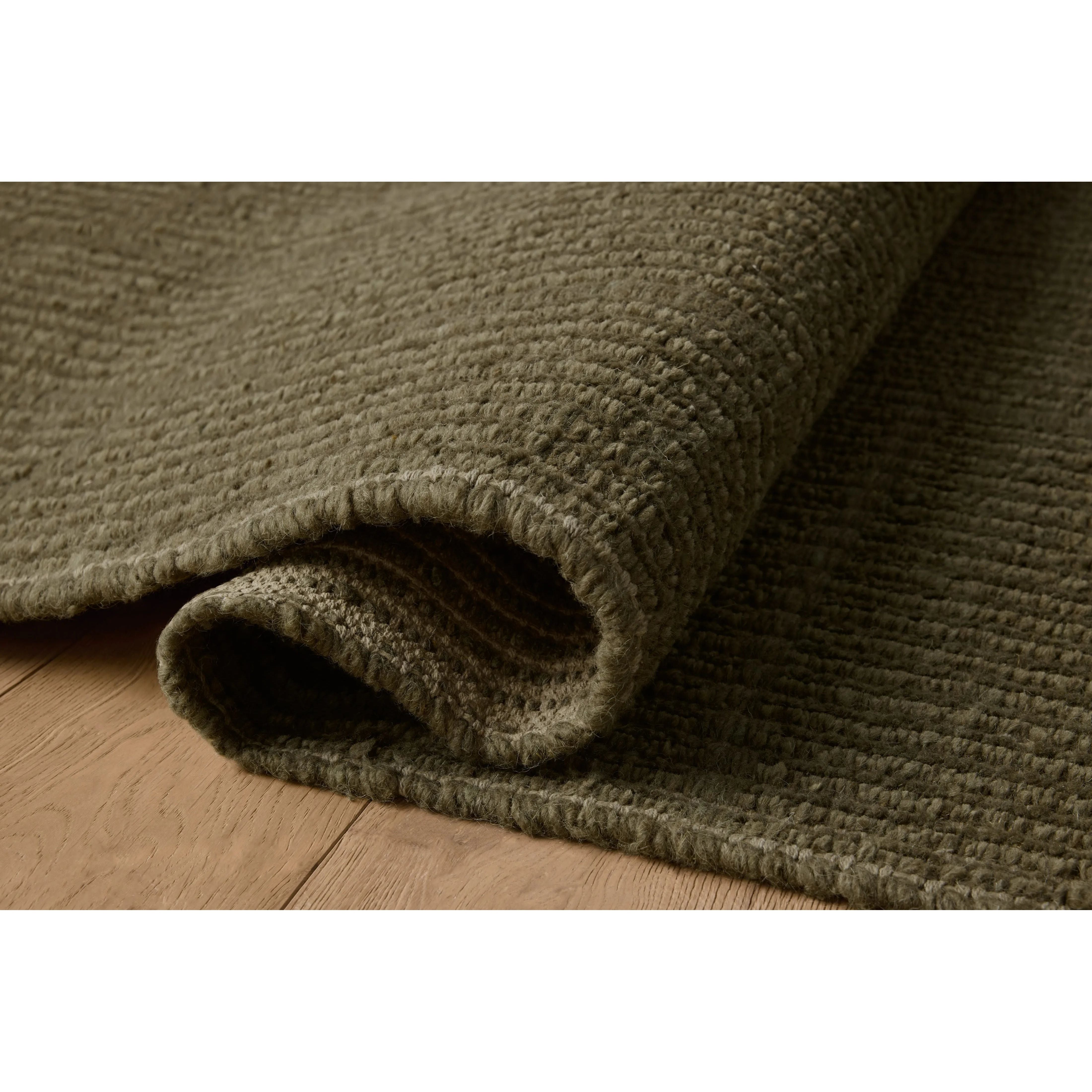 The Greenwich Collection by Jeremiah Brent x Loloi is a beautifully textured solid-toned area rug with subtle pile variation. Jeremiah loves this collection for its rich colors rooted in nature and a blended wool-and-cotton pile that’s softer and more malleable than typical wool. Amethyst Home provides interior design, new home construction design consulting, vintage area rugs, and lighting in the Los Angeles metro area.