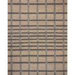 Featuring Jeremiah Brent x Loloi Perry Brown / Charcoal Rug by Loloi at Amethyst Home. The Perry Collection by Jeremiah Brent x Loloi is a singular area rug made with a special soumak weave construction, a labor-intensive process that creates beautiful details and a sturdy, thick weave. Perry combines a traditional craft with a modern linear pattern in ri. Amethyst Home provides interior design, new home construction design consulting, vintage area rugs, and lighting in the Kansas City metro area.