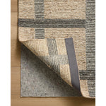 Featuring Jeremiah Brent x Loloi Perry Brown / Charcoal Rug by Loloi at Amethyst Home. The Perry Collection by Jeremiah Brent x Loloi is a singular area rug made with a special soumak weave construction, a labor-intensive process that creates beautiful details and a sturdy, thick weave. Perry combines a traditional craft with a modern linear pattern in . Amethyst Home provides interior design, new home construction design consulting, vintage area rugs, and lighting in the Newport Beach metro area.