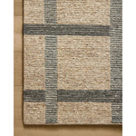 Featuring Jeremiah Brent x Loloi Perry Brown / Charcoal Rug by Loloi at Amethyst Home. The Perry Collection by Jeremiah Brent x Loloi is a singular area rug made with a special soumak weave construction, a labor-intensive process that creates beautiful details and a sturdy, thick weave. Perry combines a traditional craft with a modern linear pattern in ric. Amethyst Home provides interior design, new home construction design consulting, vintage area rugs, and lighting in the Washington metro area.