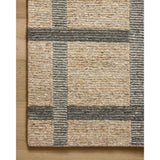 Featuring Jeremiah Brent x Loloi Perry Brown / Charcoal Rug by Loloi at Amethyst Home. The Perry Collection by Jeremiah Brent x Loloi is a singular area rug made with a special soumak weave construction, a labor-intensive process that creates beautiful details and a sturdy, thick weave. Perry combines a traditional craft with a modern linear pattern in ric. Amethyst Home provides interior design, new home construction design consulting, vintage area rugs, and lighting in the Washington metro area.