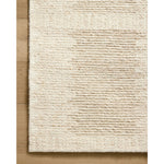 Featuring Jeremiah Brent x Loloi Perry Ivory / Taupe Rug by Loloi at Amethyst Home. The Perry Collection by Jeremiah Brent x Loloi is a singular area rug made with a special soumak weave construction, a labor-intensive process that creates beautiful details and a sturdy, thick weave. Perry combines a traditional craft with a modern linear pattern in rich y. Amethyst Home provides interior design, new home construction design consulting, vintage area rugs, and lighting in the Alpharetta metro area.
