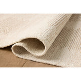 Featuring Jeremiah Brent x Loloi Perry Ivory / Taupe Rug by Loloi at Amethyst Home. The Perry Collection by Jeremiah Brent x Loloi is a singular area rug made with a special soumak weave construction, a labor-intensive process that creates beautiful details and a sturdy, thick weave. Perry combines a traditional craft with a modern linear pattern in rich . Amethyst Home provides interior design, new home construction design consulting, vintage area rugs, and lighting in the Los Angeles metro area.