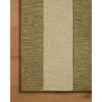 The Craven Collection is a hand-tufted area rug based on designs by Leanne Ford and made in collaboration with Loloi. Ford sketched classic stripes and checkerboards with an organic, free-flowing hand. The design comes to life with subtle space-dyed wool in creamy neutrals and rich, earthy tones. Amethyst Home provides interior design, new home construction design consulting, vintage area rugs, and lighting in the Dallas metro area.