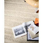 The Lennox Collection by Leanne Ford x Loloi is a statement area rug made with natural undyed wool that reveals subtle color differentiation in creamy neutral tones. The rug is hand-woven with a labor-intensive soumak weave, alternating rows of thick and thin looped yarns for an organic, inviting texture. Amethyst Home provides interior design, new home construction design consulting, vintage area rugs, and lighting in the Austin metro area.