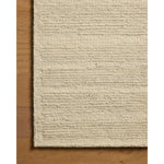 The Lennox Collection by Leanne Ford x Loloi is a statement area rug made with natural undyed wool that reveals subtle color differentiation in creamy neutral tones. The rug is hand-woven with a labor-intensive soumak weave, alternating rows of thick and thin looped yarns for an organic, inviting texture. Amethyst Home provides interior design, new home construction design consulting, vintage area rugs, and lighting in the Calabasas metro area.