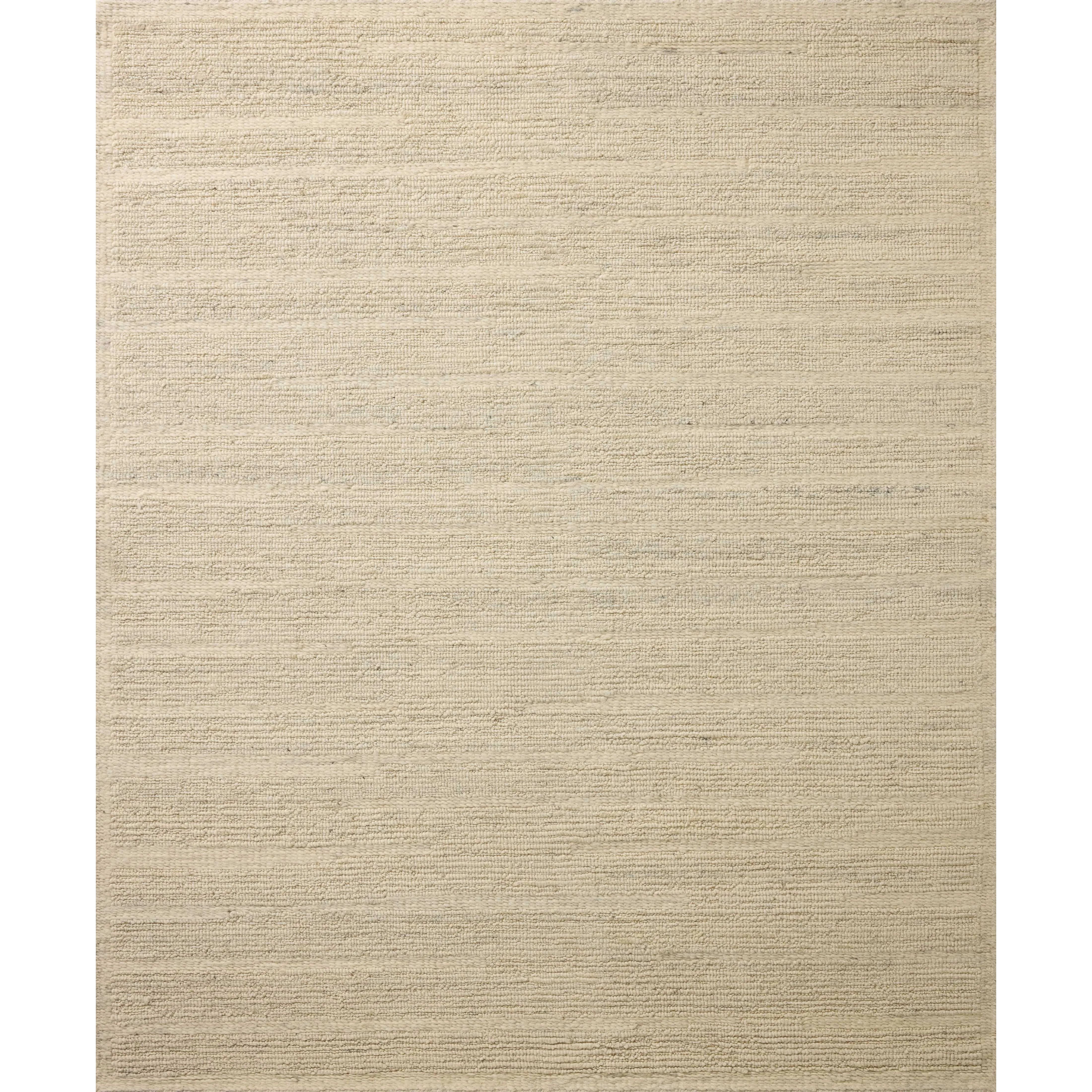 The Lennox Collection by Leanne Ford x Loloi is a statement area rug made with natural undyed wool that reveals subtle color differentiation in creamy neutral tones. The rug is hand-woven with a labor-intensive soumak weave, alternating rows of thick and thin looped yarns for an organic, inviting texture. Amethyst Home provides interior design, new home construction design consulting, vintage area rugs, and lighting in the Houston metro area.