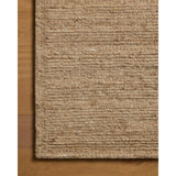 The Lennox Collection by Leanne Ford x Loloi is a statement area rug made with natural undyed wool that reveals subtle color differentiation in creamy neutral tones. The rug is hand-woven with a labor-intensive soumak weave, alternating rows of thick and thin looped yarns for an organic, inviting texture. Amethyst Home provides interior design, new home construction design consulting, vintage area rugs, and lighting in the Tampa metro area.