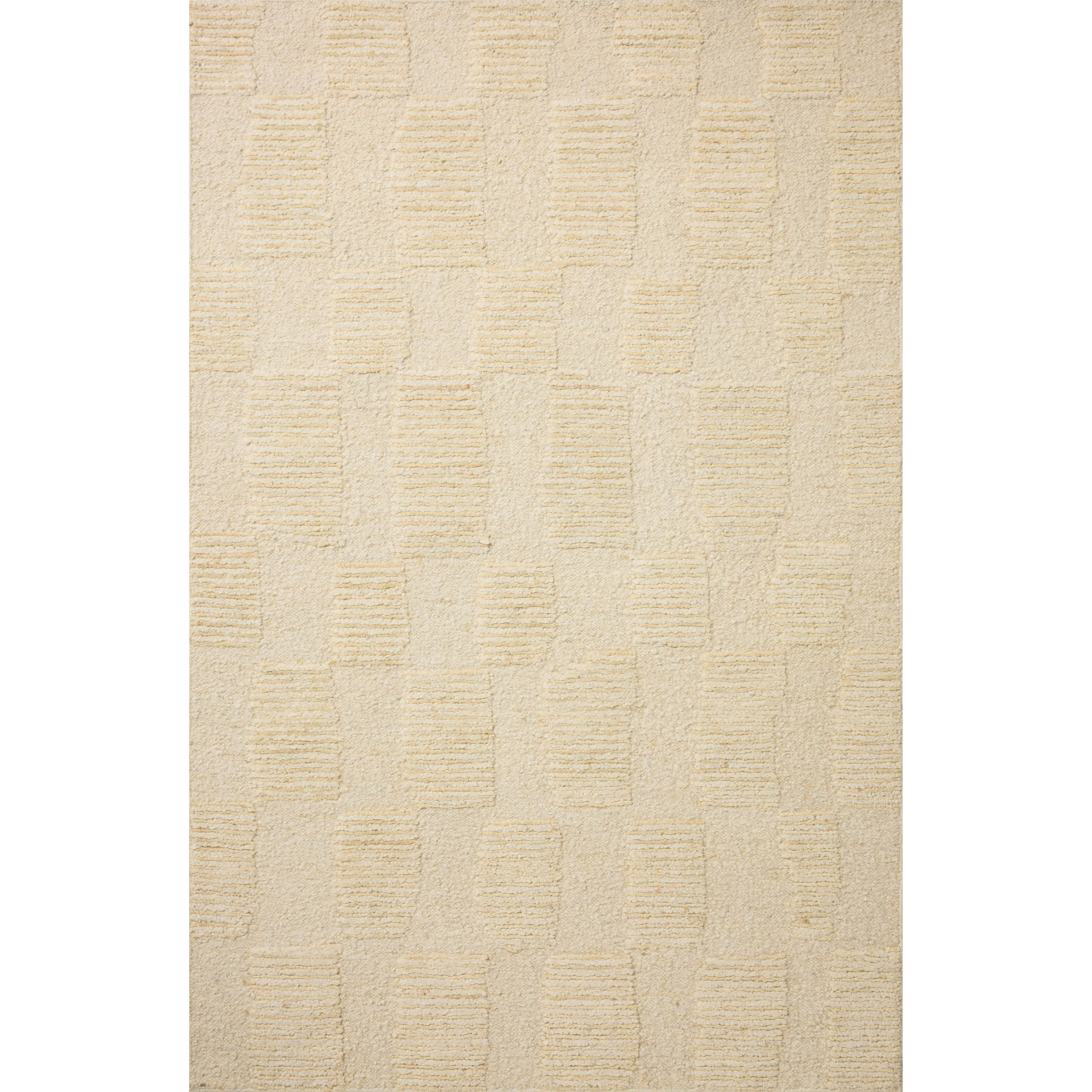 The Sowerby Collection is a wonderfully textural area rug by Leanne Ford x Loloi with a unique construction: alternating high-cut wool and jute pile on a nubby flatweave base to create an organic checkerboard pattern. Available in creamy neutrals and rich, earthy tones, Sowerby is a sophisticated neutral rug for living rooms, bedrooms, and more. Amethyst Home provides interior design, new home construction design consulting, vintage area rugs, and lighting in the Kansas City metro area.