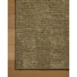 The Sowerby Collection is a wonderfully textural area rug by Leanne Ford x Loloi with a unique construction: alternating high-cut wool and jute pile on a nubby flatweave base to create an organic checkerboard pattern. Available in creamy neutrals and rich, earthy tones, Sowerby is a sophisticated neutral rug for living rooms, bedrooms, and more. Amethyst Home provides interior design, new home construction design consulting, vintage area rugs, and lighting in the Laguna Beach metro area.