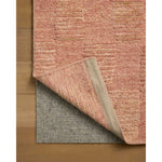 The Sowerby Collection is a wonderfully textural area rug by Leanne Ford x Loloi with a unique construction: alternating high-cut wool and jute pile on a nubby flatweave base to create an organic checkerboard pattern. Available in creamy neutrals and rich, earthy tones, Sowerby is a sophisticated neutral rug for living rooms, bedrooms, and more. Amethyst Home provides interior design, new home construction design consulting, vintage area rugs, and lighting in the Newport Beach metro area.