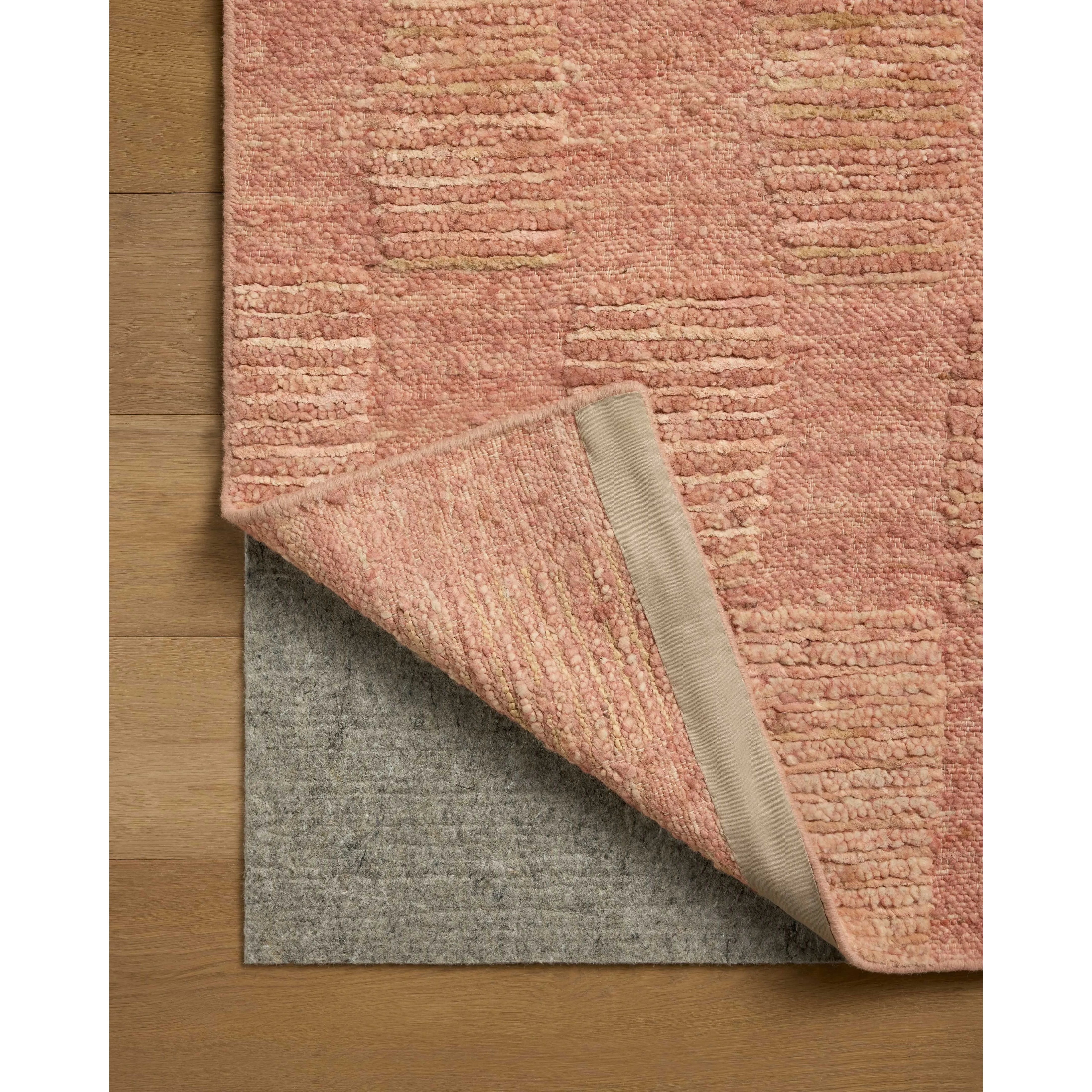 The Sowerby Collection is a wonderfully textural area rug by Leanne Ford x Loloi with a unique construction: alternating high-cut wool and jute pile on a nubby flatweave base to create an organic checkerboard pattern. Available in creamy neutrals and rich, earthy tones, Sowerby is a sophisticated neutral rug for living rooms, bedrooms, and more. Amethyst Home provides interior design, new home construction design consulting, vintage area rugs, and lighting in the Newport Beach metro area.