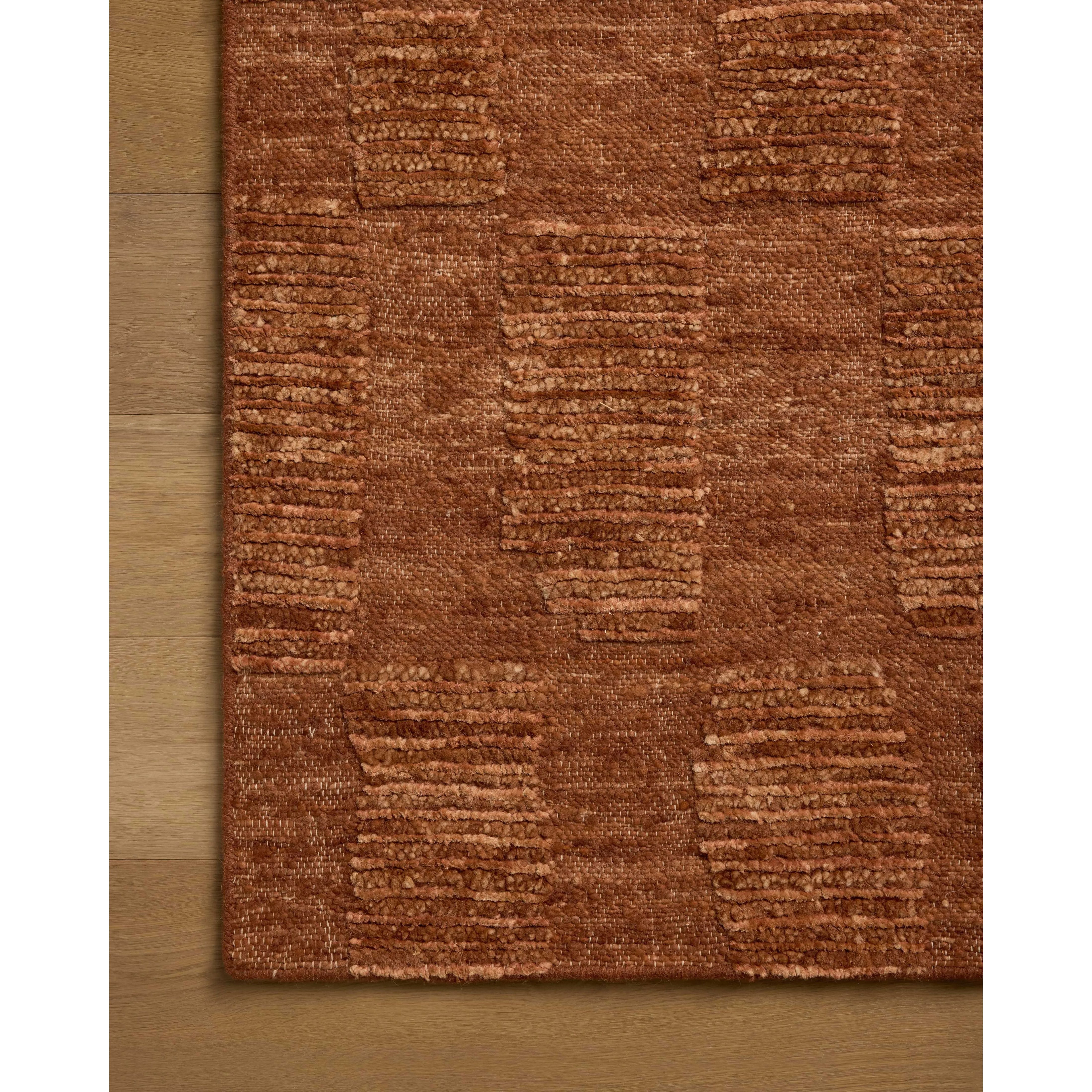 The Sowerby Collection is a wonderfully textural area rug by Leanne Ford x Loloi with a unique construction: alternating high-cut wool and jute pile on a nubby flatweave base to create an organic checkerboard pattern. Available in creamy neutrals and rich, earthy tones, Sowerby is a sophisticated neutral rug for living rooms, bedrooms, and more. Amethyst Home provides interior design, new home construction design consulting, vintage area rugs, and lighting in the Charlotte metro area.