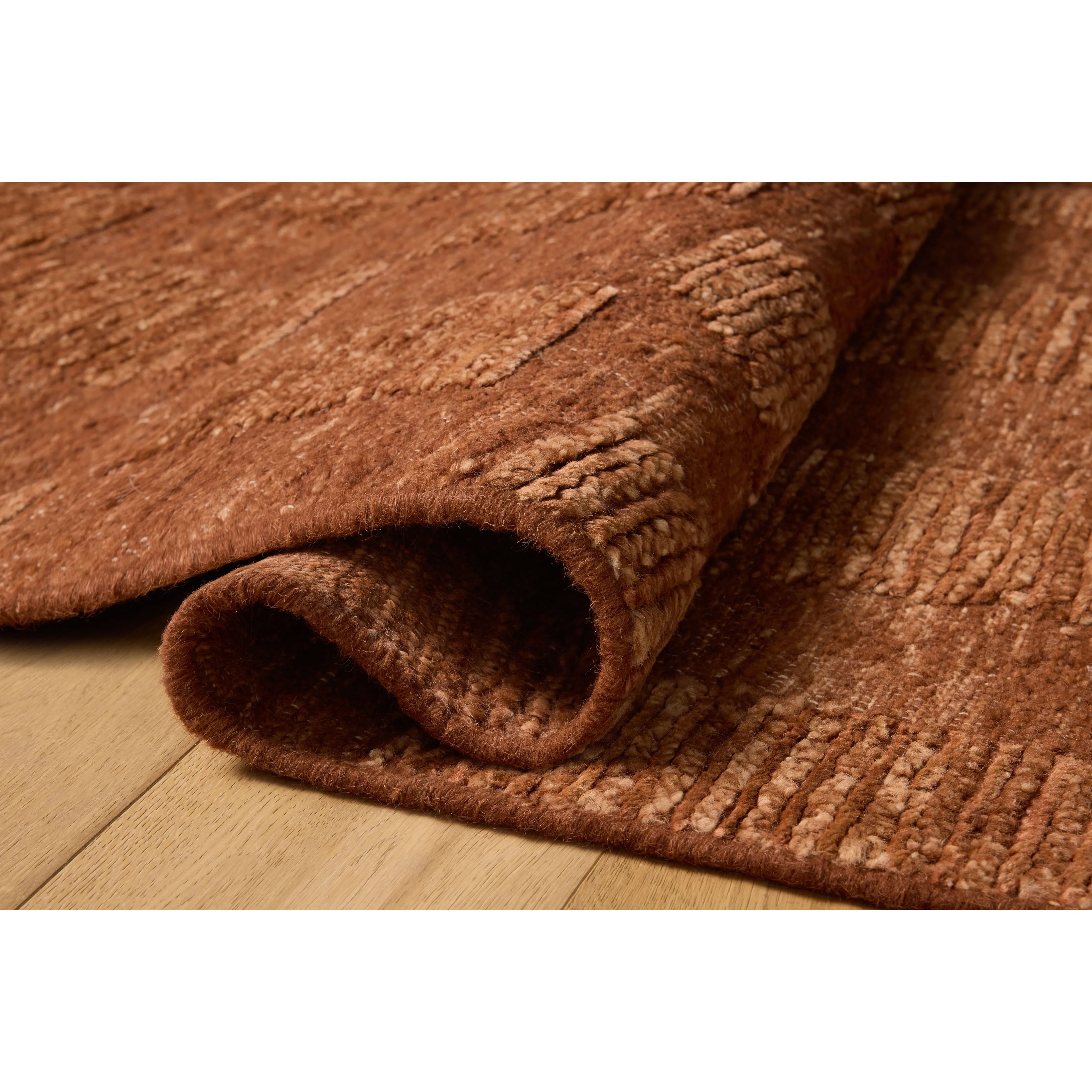 The Sowerby Collection is a wonderfully textural area rug by Leanne Ford x Loloi with a unique construction: alternating high-cut wool and jute pile on a nubby flatweave base to create an organic checkerboard pattern. Available in creamy neutrals and rich, earthy tones, Sowerby is a sophisticated neutral rug for living rooms, bedrooms, and more. Amethyst Home provides interior design, new home construction design consulting, vintage area rugs, and lighting in the Omaha metro area.