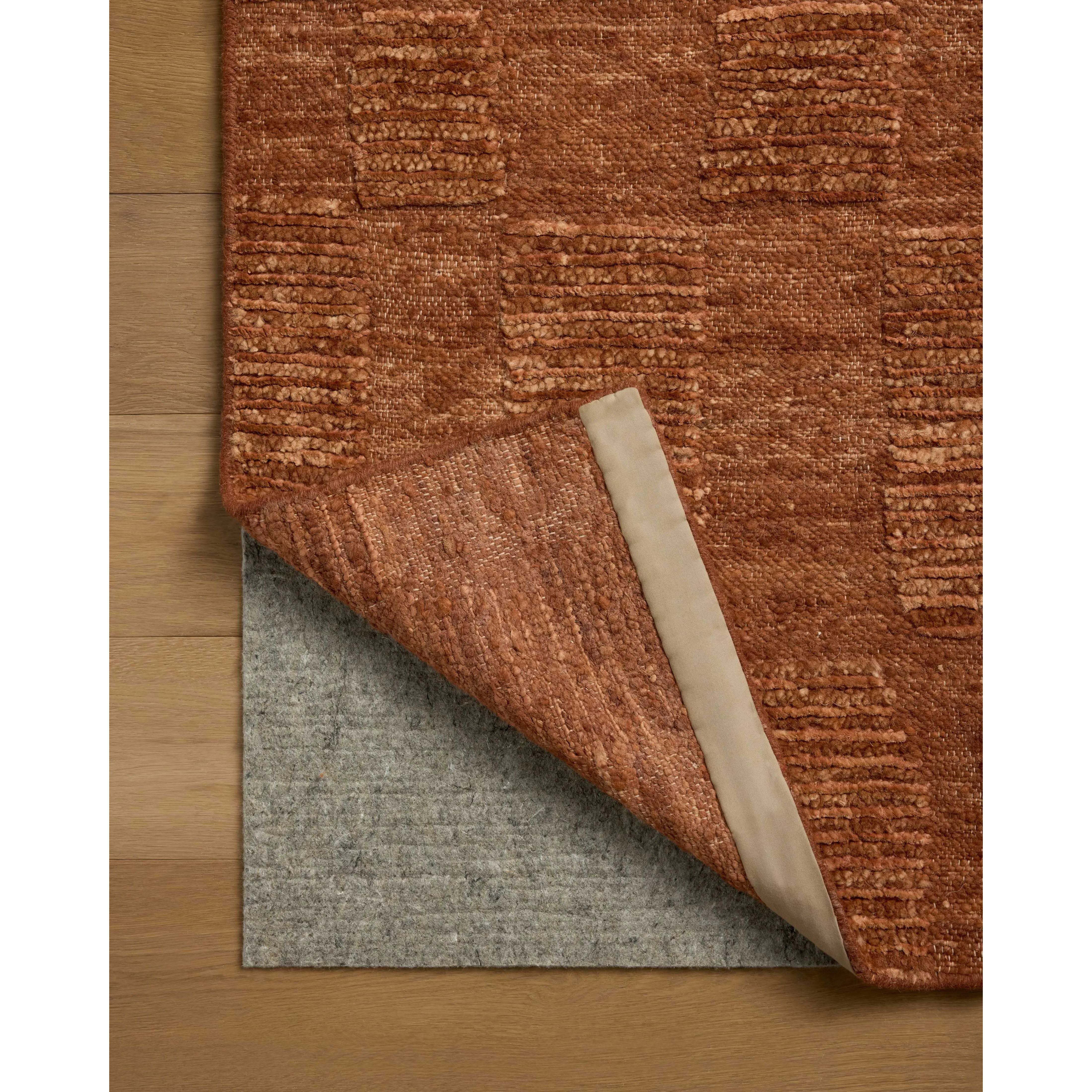 The Sowerby Collection is a wonderfully textural area rug by Leanne Ford x Loloi with a unique construction: alternating high-cut wool and jute pile on a nubby flatweave base to create an organic checkerboard pattern. Available in creamy neutrals and rich, earthy tones, Sowerby is a sophisticated neutral rug for living rooms, bedrooms, and more. Amethyst Home provides interior design, new home construction design consulting, vintage area rugs, and lighting in the Portland metro area.