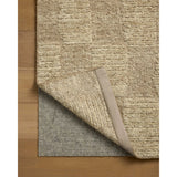 The Sowerby Collection is a wonderfully textural area rug by Leanne Ford x Loloi with a unique construction: alternating high-cut wool and jute pile on a nubby flatweave base to create an organic checkerboard pattern. Available in creamy neutrals and rich, earthy tones, Sowerby is a sophisticated neutral rug for living rooms, bedrooms, and more. Amethyst Home provides interior design, new home construction design consulting, vintage area rugs, and lighting in the Calabasas metro area.