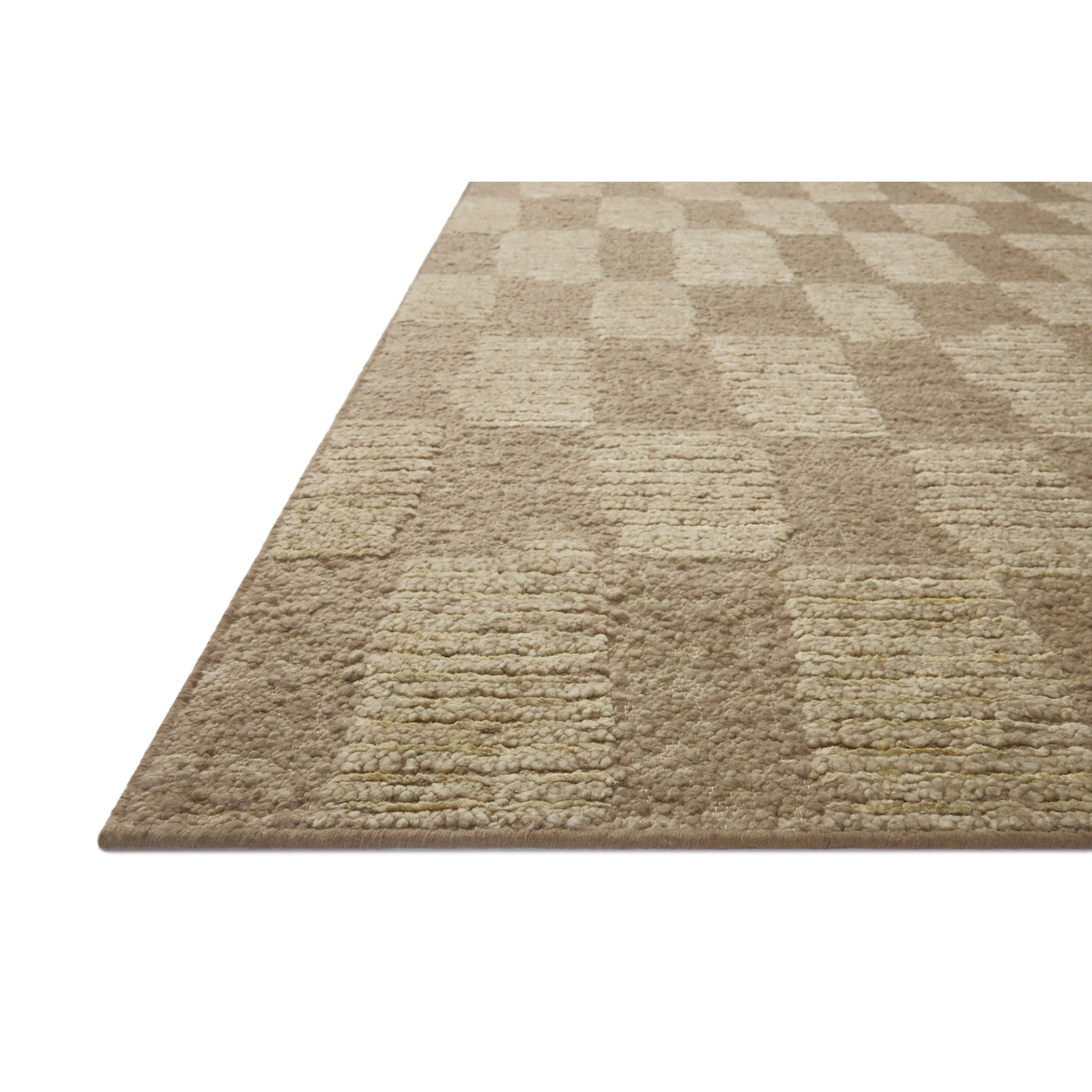 The Sowerby Collection is a wonderfully textural area rug by Leanne Ford x Loloi with a unique construction: alternating high-cut wool and jute pile on a nubby flatweave base to create an organic checkerboard pattern. Available in creamy neutrals and rich, earthy tones, Sowerby is a sophisticated neutral rug for living rooms, bedrooms, and more. Amethyst Home provides interior design, new home construction design consulting, vintage area rugs, and lighting in the San Diego metro area.