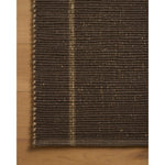 The Weatherstaff Collection is a vertically striped jute area rug with an organic look and feel, designed by Leanne Ford x Loloi. The earth-toned area rug features flatwoven jute that creates a ribbed texture horizontally, with stripes that are vertical—a playful combination. Amethyst Home provides interior design, new home construction design consulting, vintage area rugs, and lighting in the Laguna Beach metro area.