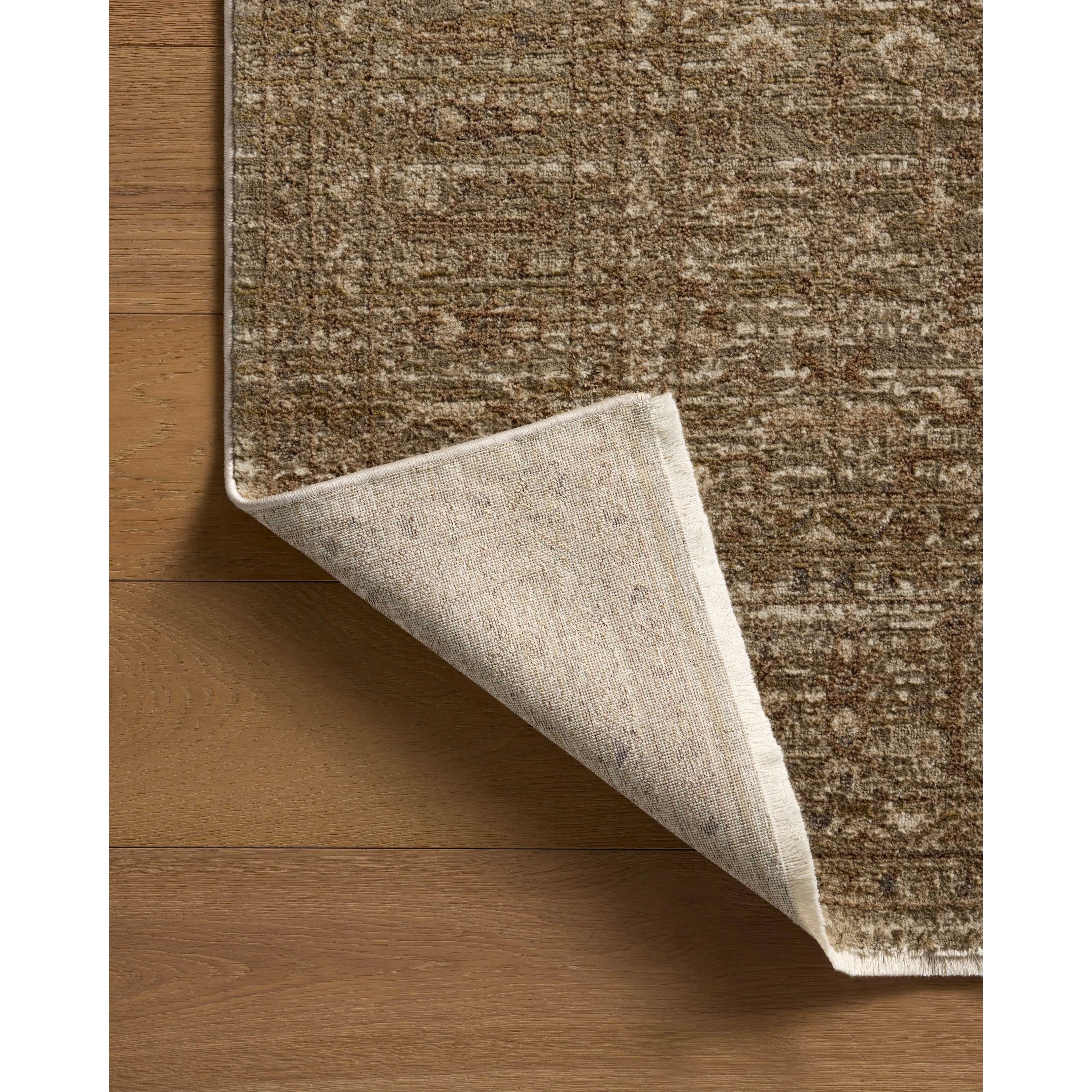 Featuring Haywood Brown Rug by Loloi at Amethyst Home. The Haywood Collection is an easy-to-clean, earth-toned area rug with a subtly distressed traditional design. Haywood is power-loomed of polyester in Turkey, a durable area rug for a living room, bedroom, dining room, or other high-traffic spaces.  Power Loomed  HYD-01 Loloi Ii x Loloi Brown. Amethyst Home provides interior design, new home construction design consulting, vintage area rugs, and lighting in the Winter Garden metro area.