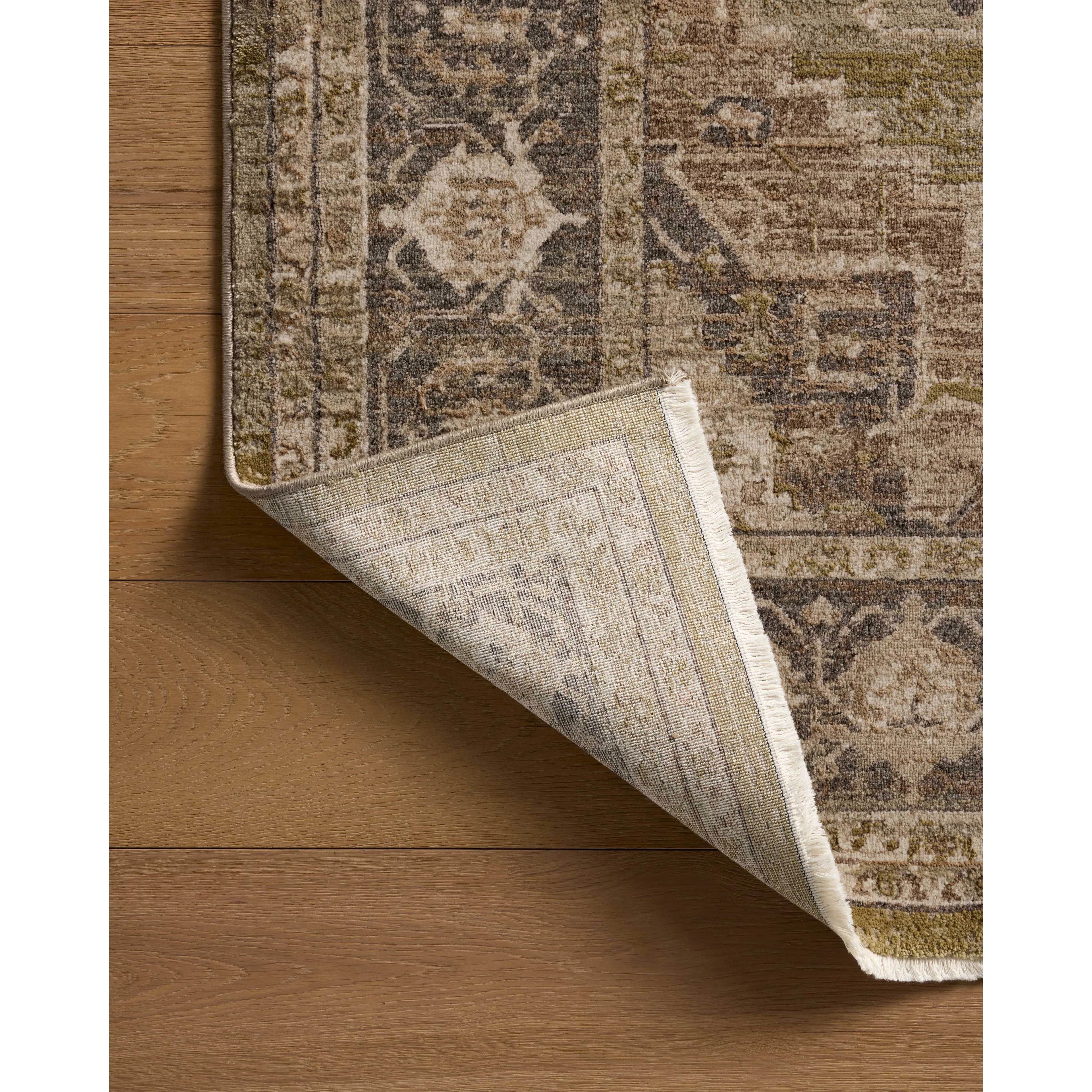 Featuring Haywood Charcoal Rug by Loloi at Amethyst Home. The Haywood Collection is an easy-to-clean, earth-toned area rug with a subtly distressed traditional design. Haywood is power-loomed of polyester in Turkey, a durable area rug for a living room, bedroom, dining room, or other high-traffic spaces.  Power Loomed  HYD-03 Loloi Ii x Loloi Charcoal. Amethyst Home provides interior design, new home construction design consulting, vintage area rugs, and lighting in the Alpharetta metro area.