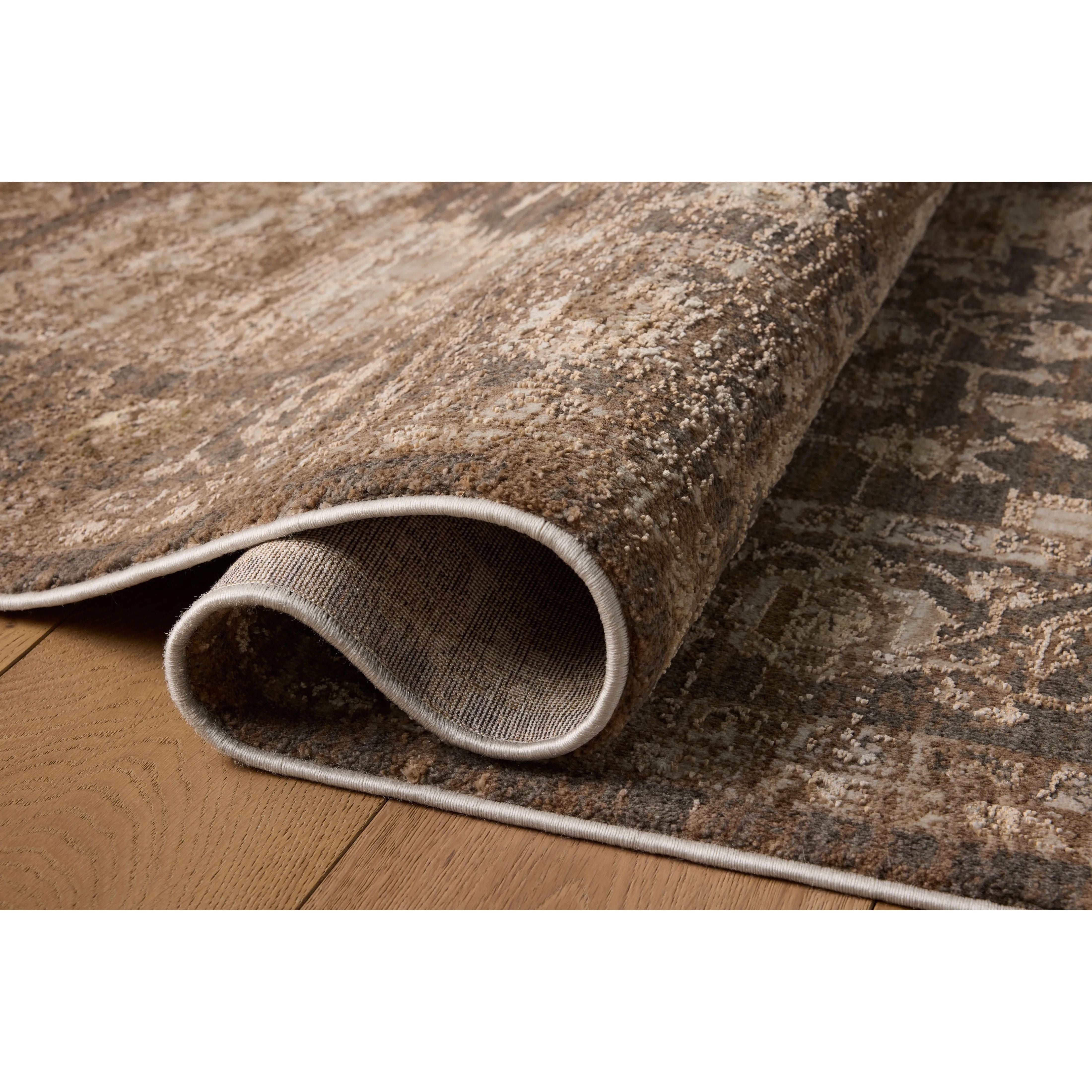 Featuring Haywood Mocha Rug by Loloi at Amethyst Home. The Haywood Collection is an easy-to-clean, earth-toned area rug with a subtly distressed traditional design. Haywood is power-loomed of polyester in Turkey, a durable area rug for a living room, bedroom, dining room, or other high-traffic spaces.  Power Loomed  HYD-03 Loloi Ii x Loloi Mocha. Amethyst Home provides interior design, new home construction design consulting, vintage area rugs, and lighting in the Nashville metro area.