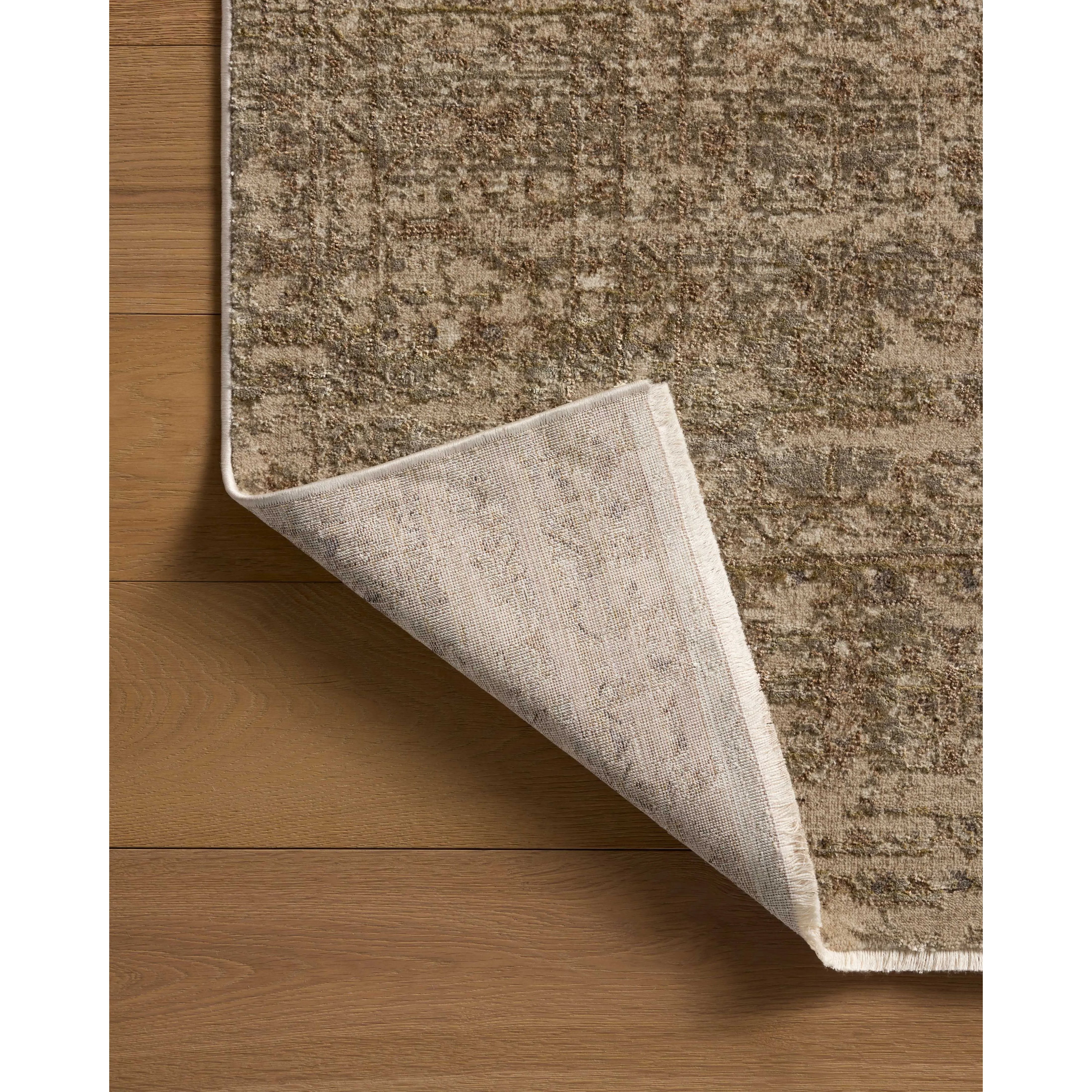 Featuring Haywood Sand Rug by Loloi at Amethyst Home. The Haywood Collection is an easy-to-clean, earth-toned area rug with a subtly distressed traditional design. Haywood is power-loomed of polyester in Turkey, a durable area rug for a living room, bedroom, dining room, or other high-traffic spaces.  Power Loomed  HYD-01 Loloi Ii x Loloi Sand. Amethyst Home provides interior design, new home construction design consulting, vintage area rugs, and lighting in the Salt Lake City metro area.