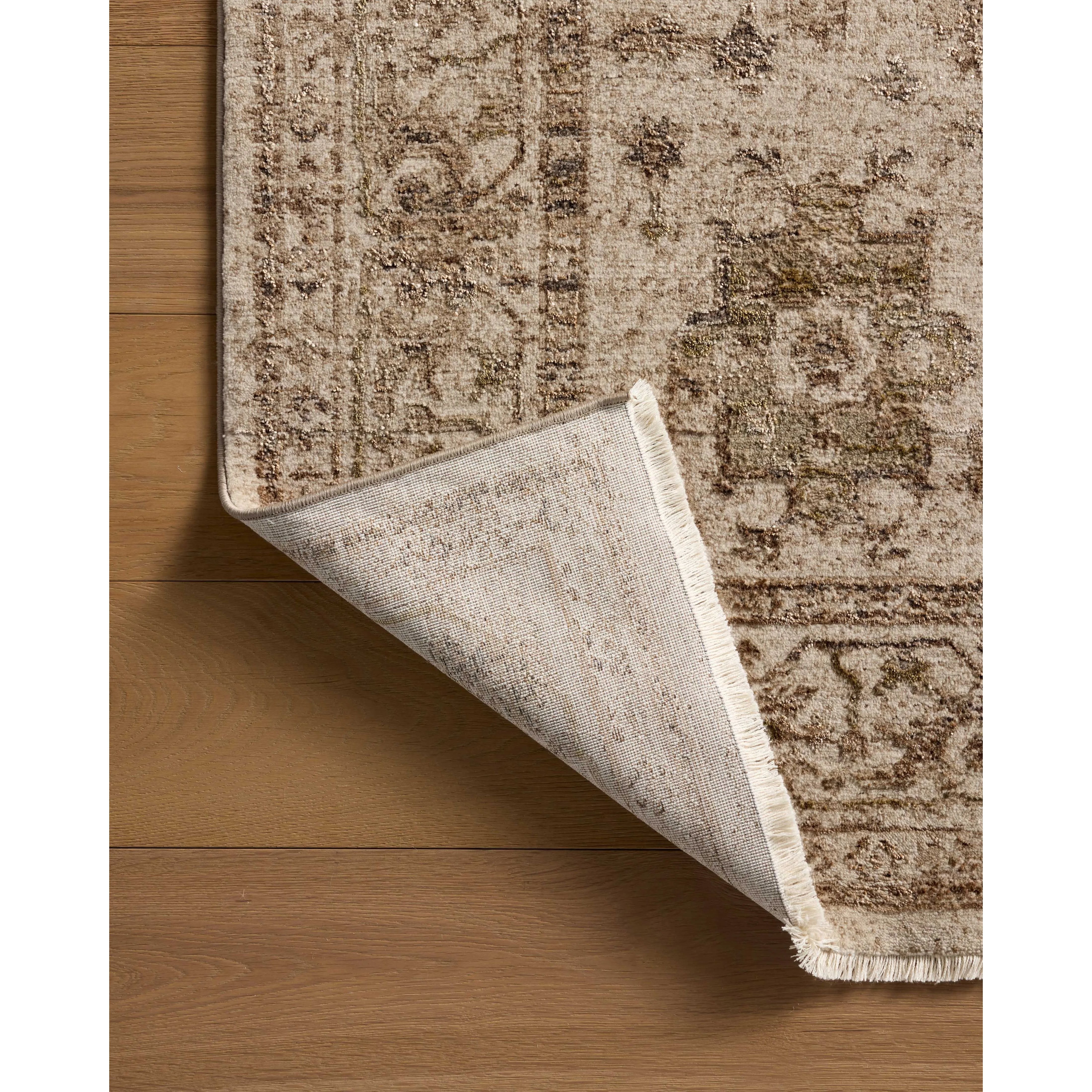 Featuring Haywood Taupe Rug by Loloi at Amethyst Home. The Haywood Collection is an easy-to-clean, earth-toned area rug with a subtly distressed traditional design. Haywood is power-loomed of polyester in Turkey, a durable area rug for a living room, bedroom, dining room, or other high-traffic spaces.  Power Loomed  HYD-04 Loloi Ii x Loloi Taupe. Amethyst Home provides interior design, new home construction design consulting, vintage area rugs, and lighting in the Austin metro area.