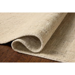 The Maren Collection is a unique handmade area rug made with a new technique that creates a dotted texture, almost like fine embroidery, but with a substantial hand-loomed feel. The pile reveals modern geometric patterns with organic shapes and natural softness, available in light, easygoing neutrals. Amethyst Home provides interior design, new home construction design consulting, vintage area rugs, and lighting in the Monterey metro area.