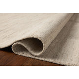 The Maren Collection is a unique handmade area rug made with a new technique that creates a dotted texture, almost like fine embroidery, but with a substantial hand-loomed feel. The pile reveals modern geometric patterns with organic shapes and natural softness, available in light, easygoing neutrals. Amethyst Home provides interior design, new home construction design consulting, vintage area rugs, and lighting in the Omaha metro area.