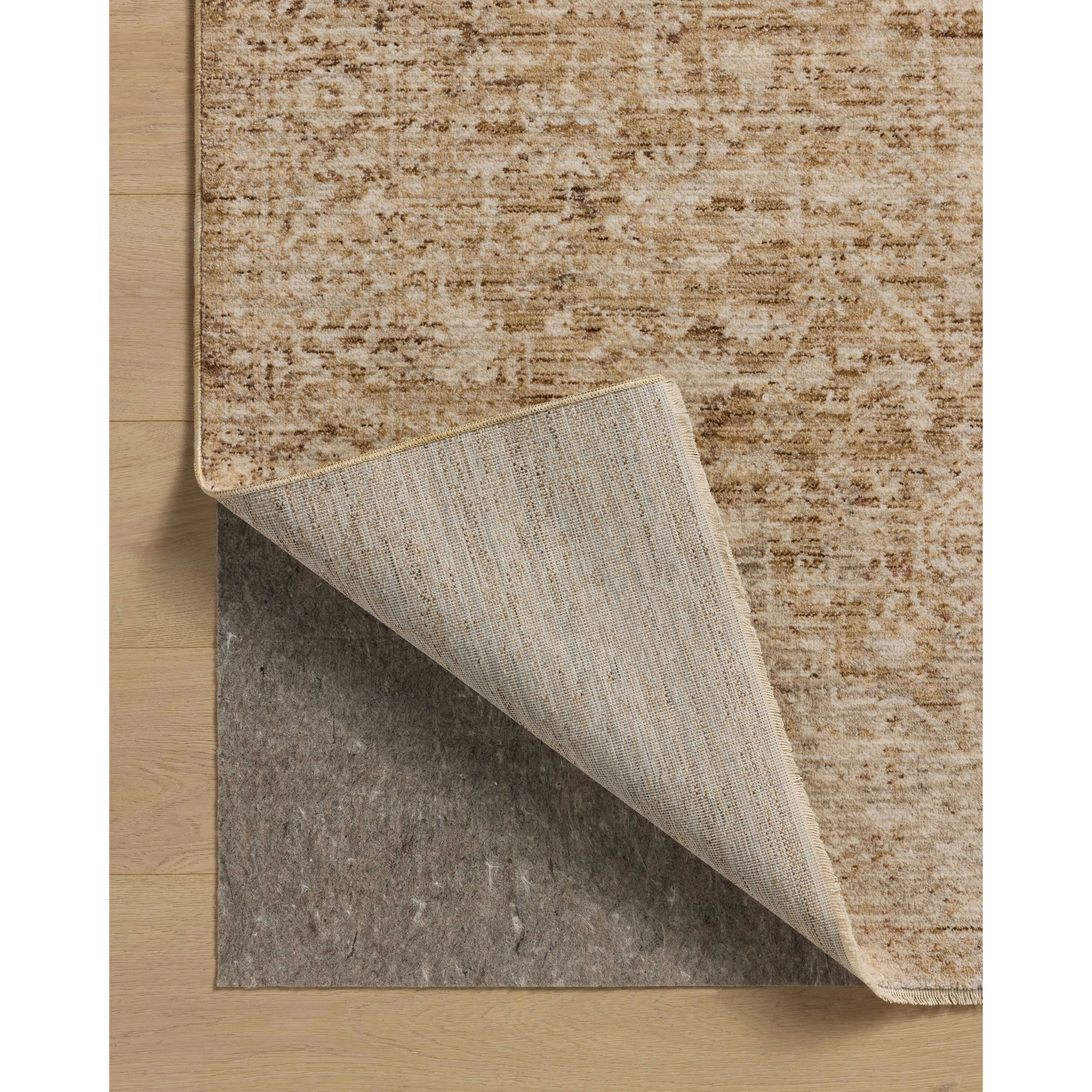 Featuring Newman Wheat / Natural Rug by Loloi at Amethyst Home. The Newman Collection is a power-loomed area rug made of soft space-dyed polyester, which lends a subtle gradation of color in an easy-to-clean, no-shed construction. The versatile, vintage-inspired design features distressed white motifs against lovely and light tonal backgrounds. The Newman Coll. Amethyst Home provides interior design, new home construction design consulting, vintage area rugs, and lighting in the Boston metro area.