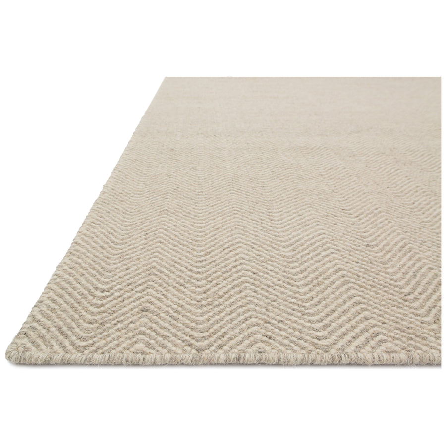 The flat-woven Oakwood Gravel Rug is an earthy neutral that benefits from natural, dye-free wool. The handwoven rugs have an intricate speckled look, thanks to the nature of pure, fine wool. Amethyst Home provides interior design, new home construction design consulting, vintage area rugs, and lighting in the Charlotte metro area.