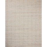 The Sonya Ivory / Natural Rug is a hand-loomed area rug with a light, airy palette and understated graphic design. The rug’s textural pile is a soft blend of wool and nylon that creates dimension in living rooms, bedrooms, and more. Amethyst Home provides interior design, new home construction design consulting, vintage area rugs, and lighting in the Portland metro area.