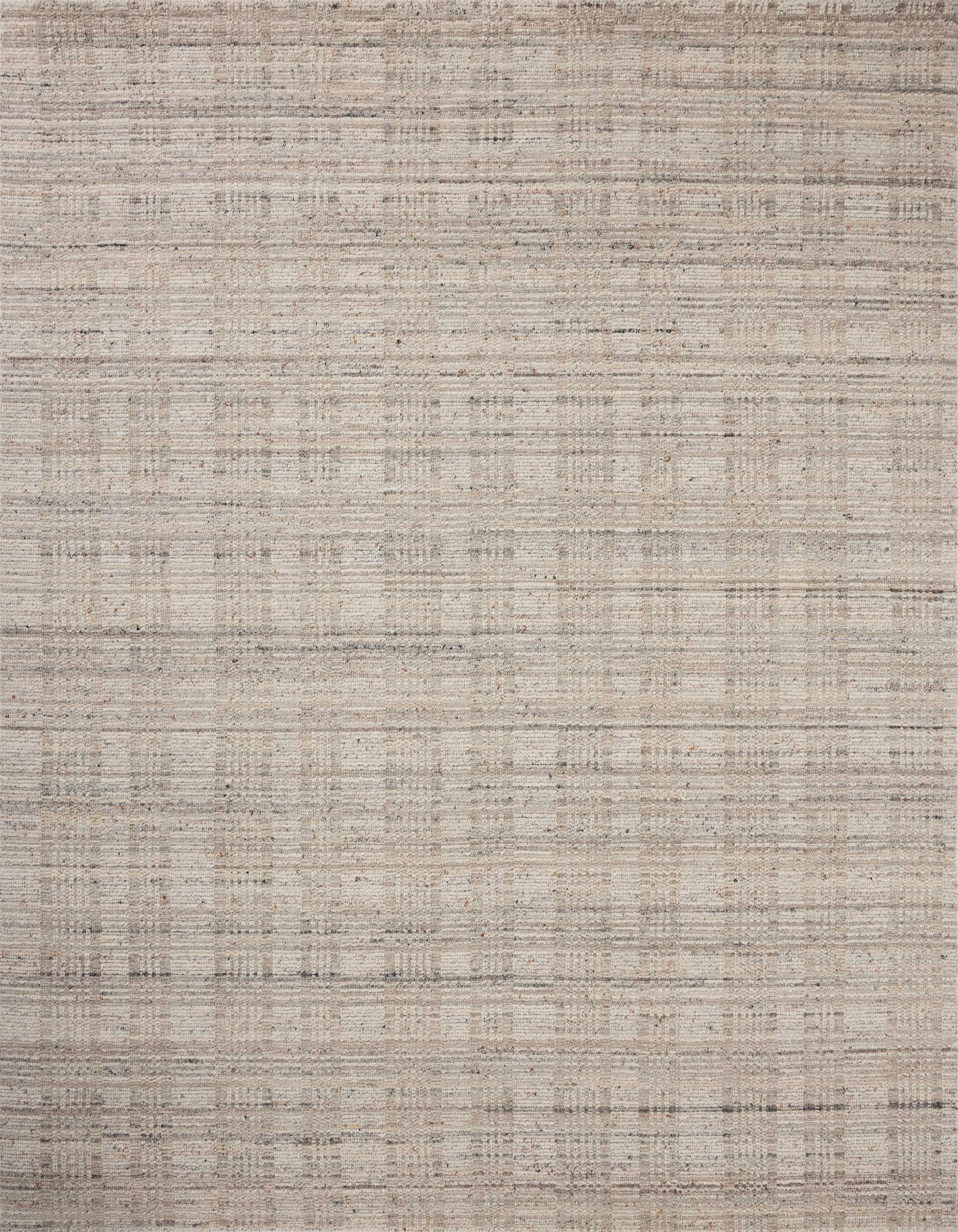 The Sonya Pebble / Fog Rug is a hand-loomed area rug with a light, airy palette and understated graphic design. The rug’s textural pile is a soft blend of wool and nylon that creates dimension in living rooms, bedrooms, and more. Amethyst Home provides interior design, new home construction design consulting, vintage area rugs, and lighting in the Park City metro area.