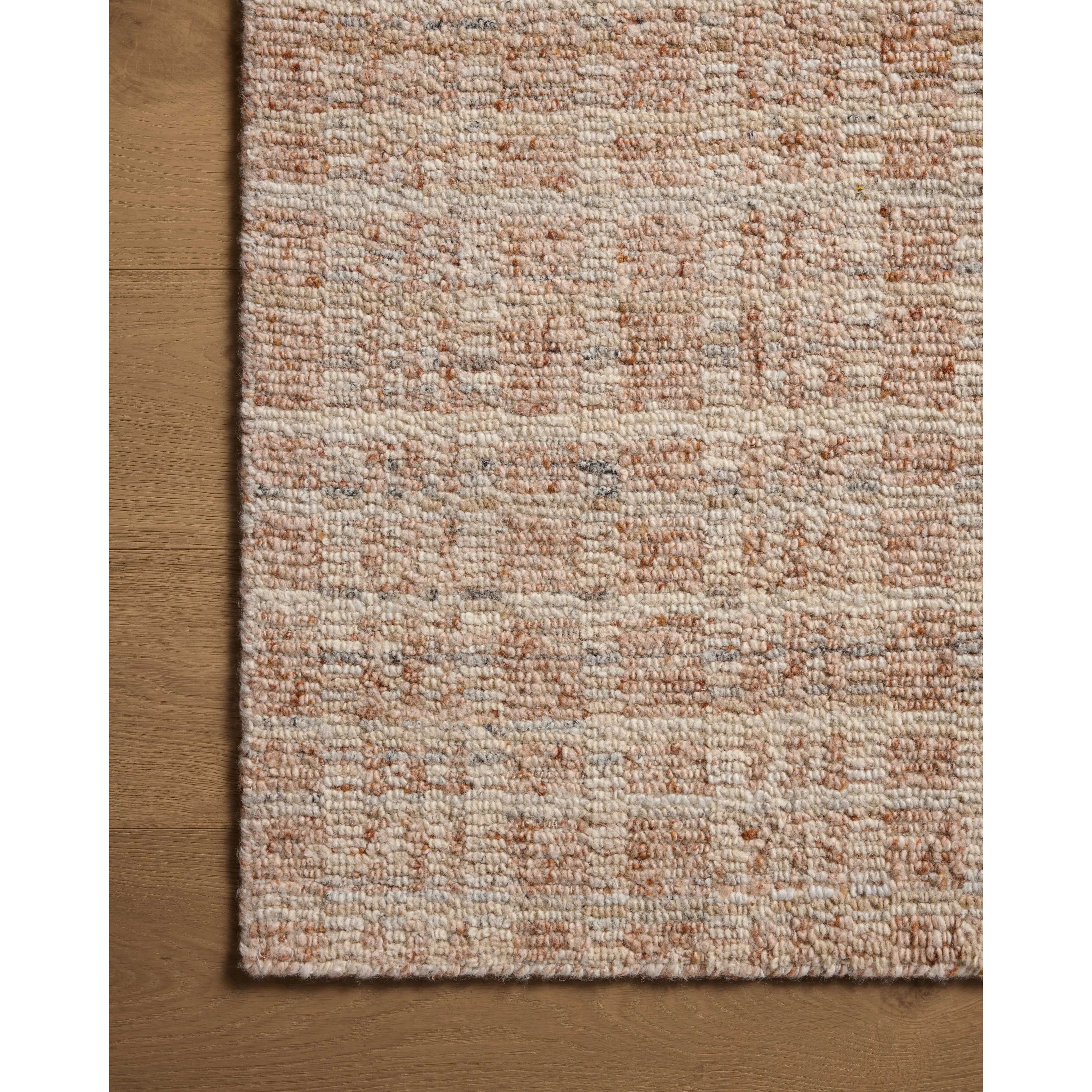 The Sonya Terracotta / Natural Rug is a hand-loomed area rug with a light, airy palette and understated graphic design. The rug’s textural pile is a soft blend of wool and nylon that creates dimension in living rooms, bedrooms, and more. Amethyst Home provides interior design, new home construction design consulting, vintage area rugs, and lighting in the San Diego metro area.