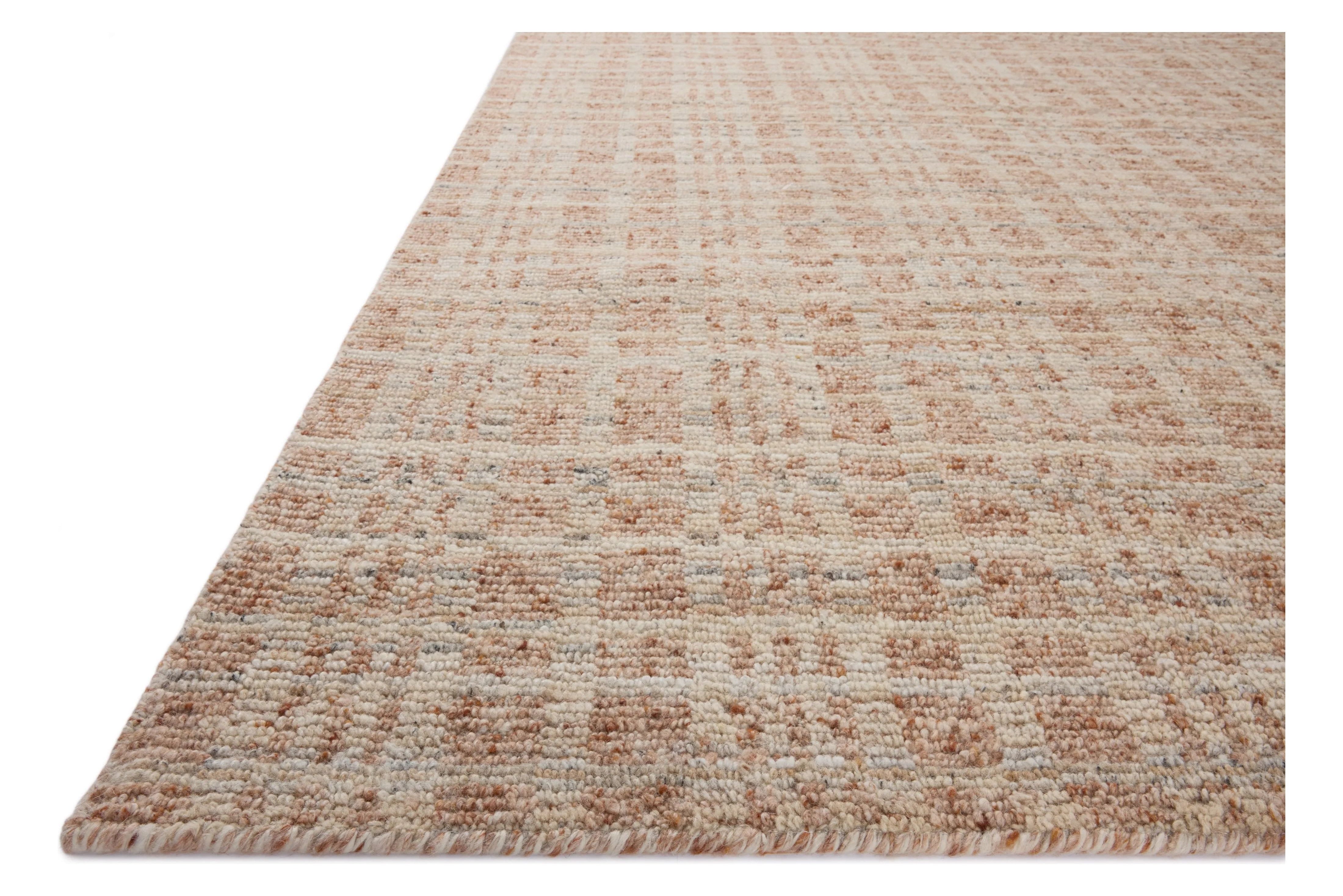 The Sonya Terracotta / Natural Rug is a hand-loomed area rug with a light, airy palette and understated graphic design. The rug’s textural pile is a soft blend of wool and nylon that creates dimension in living rooms, bedrooms, and more. Amethyst Home provides interior design, new home construction design consulting, vintage area rugs, and lighting in the Washington metro area.