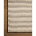 Sophisticated ribbing runs across the Sterling Collection, a nicely textured area rug with a natural color palette rich in tonality. Sterling is hand-loomed of polyester that's refreshingly easy to clean and withstands high-traffic in living rooms, dining rooms, or bedrooms. Amethyst Home provides interior design, new home construction design consulting, vintage area rugs, and lighting in the Nashville metro area.