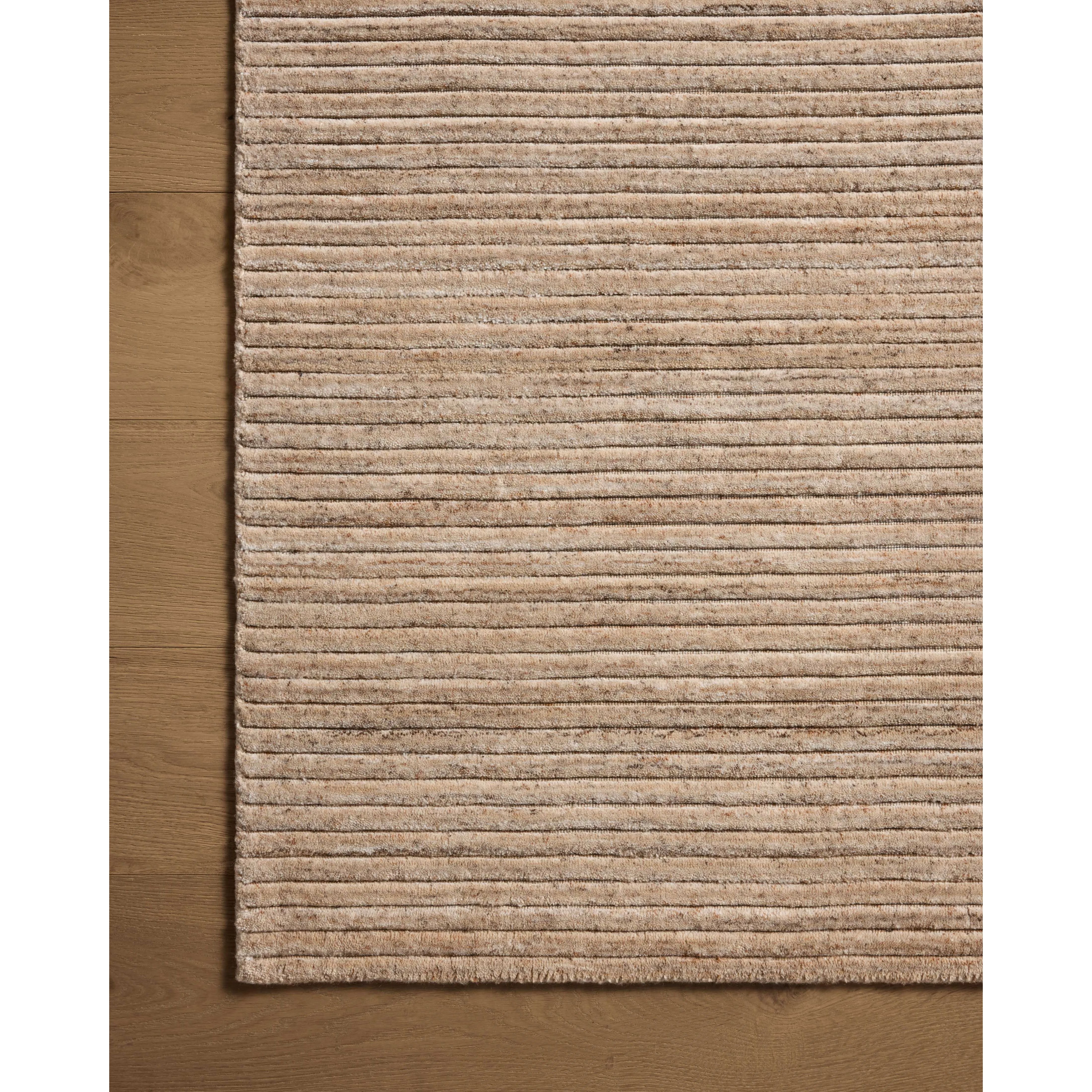 Sophisticated ribbing runs across the Sterling Collection, a nicely textured area rug with a natural color palette rich in tonality. Sterling is hand-loomed of polyester that's refreshingly easy to clean and withstands high-traffic in living rooms, dining rooms, or bedrooms. Amethyst Home provides interior design, new home construction design consulting, vintage area rugs, and lighting in the Newport Beach metro area.