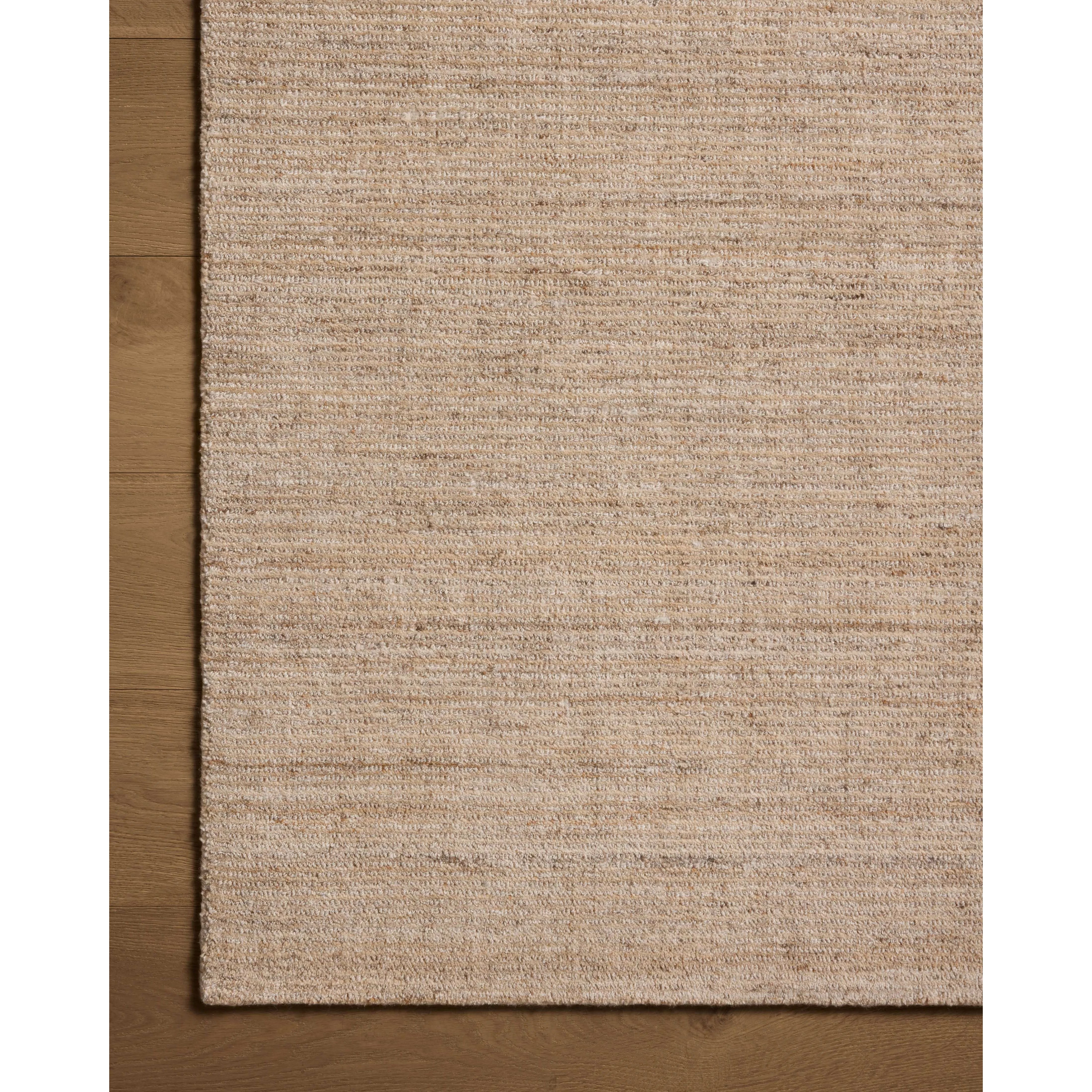 Featuring Thorne Sand Rug by Loloi at Amethyst Home. The Thorne Collection is a hand-loomed area rug with thin, textured lines. The rug's neutral, heathered tones add levity to living rooms, coziness to bedrooms, and casual warmth to dining rooms. Thorne is loomed of durable, easy-to-clean polyester in India and GoodWeave-certified, ensuring our commitment to e. Amethyst Home provides interior design, new home construction design consulting, vintage area rugs, and lighting in the Omaha metro area.