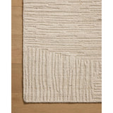 Featuring Woods Bone Rug by Loloi at Amethyst Home. The Woods Collection is a hand-woven area rug with a solid-colored, textured design for elevated home decor. It has a blended wool and rayon pile that is saturated with color and has a subtle sheen, a beautiful rug for living rooms, bedrooms, and more. This collection is made in India and Goodweave-certified. Amethyst Home provides interior design, new home construction design consulting, vintage area rugs, and lighting in the Houston metro area.