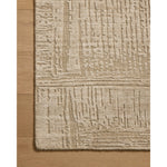 Featuring Woods Oatmeal Rug by Loloi at Amethyst Home. The Woods Collection is a hand-woven area rug with a solid-colored, textured design for elevated home decor. It has a blended wool and rayon pile that is saturated with color and has a subtle sheen, a beautiful rug for living rooms, bedrooms, and more. This collection is made in India and Goodweave-certifie. Amethyst Home provides interior design, new home construction design consulting, vintage area rugs, and lighting in the Tampa metro area.