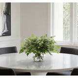 Create a luxurious atmosphere with this green Birch Leaf, housed in a glass vase. At 15", this piece captures the natural beauty of each petal, making it ideal for brightening up office desks or kitchen countertops. Admire the lifelike blooms and rich foliage, providing a timeless touch to your home's ambiance Amethyst Home provides interior design, new home construction design consulting, vintage area rugs, and lighting in the Portland metro area.