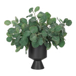 Bring timeless beauty into your home with the green Eucalyptus in a footed vase. At 17", this piece captures the natural beauty of each petal, making it ideal for brightening up office desks or kitchen countertops. Admire the lifelike blooms and rich foliage, providing a timeless touch to your home's ambiance Amethyst Home provides interior design, new home construction design consulting, vintage area rugs, and lighting in the Tampa metro area.