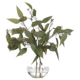 Bring timeless beauty into your home with the green Eucalyptus in a glass bubble. Standing at 18", this lifelike faux design adds sophistication, perfect for a dining table centerpiece or console display. Admire the lifelike blooms and rich foliage, providing a timeless touch to your home's ambiance Amethyst Home provides interior design, new home construction design consulting, vintage area rugs, and lighting in the Salt Lake City metro area.
