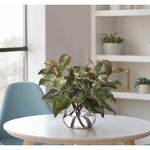 Add a burst of elegance with the green Magnolia Branch, set in a glass vase. Standing at 15", this lifelike faux design adds sophistication, perfect for a dining table centerpiece or console display. Experience the charm of this arrangement, maintenance-free and ideal for those who love fresh, vibrant decor Amethyst Home provides interior design, new home construction design consulting, vintage area rugs, and lighting in the Des Moines metro area.