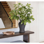 Embrace nature's charm with the green Money Tree Branch, thoughtfully displayed in a resin urn. Reaching 41", it's a graceful addition that enhances small nooks, shelves, or bathroom vanities, adding a refined touch. A stunning addition to any setting, it remains fresh and beautiful, with zero effort required Amethyst Home provides interior design, new home construction design consulting, vintage area rugs, and lighting in the Austin metro area.