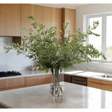 Bring timeless beauty into your home with the green Smilex in a glass vase. Standing at 48" , this lifelike faux design adds sophistication, perfect for a dining table centerpiece or console display. This piece brings everlasting elegance, staying vibrant for any occasion without the hassle of care Amethyst Home provides interior design, new home construction design consulting, vintage area rugs, and lighting in the Laguna Beach metro area.