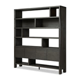 Featuring Noeline Smoked Black Oak Wide Bookcase by Four Hands at Amethyst Home. Made from solid oak and oak veneer and finished in a smoked black, a wide bookcase offers open and concealed shelving, for both storage and display. Push-latch doors make for a clean, seamless look, while subtly rounded corners soften up the whole look.Overall Dimensions: 84.00"w x 18.00"d x 94.00"hWeigh. Amethyst Home provides interior design, new construction, custom furniture, and area rugs in the Austin metro area