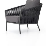 Featuring Porto Venao Charcoal Outdoor Chair by Four Hands at Amethyst Home. The perfect place for outdoor daydreaming. A beautiful rope-based design is woven across a durable aluminum frame in a rich bronze finish. Topped with a wide cushion and throw pillow, all upholstered in 100% olefin, known for its UV-resistant, water-repellent and quick-drying abilities. Cover or store indoors. Amethyst Home provides interior design, new construction, custom furniture, and area rugs in the Miami metro area